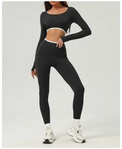 Black long sleeve crop top and high waist yoga pants set, perfect for running, fitness and gym.