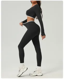 Women's fitness athletic set long sleeve crop top high waist yoga pants running workout wear.