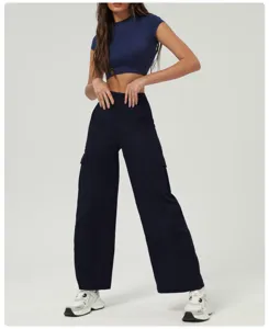 Detail view of the stylish navy blue crop top and high waist cargo wide leg pants outfit.