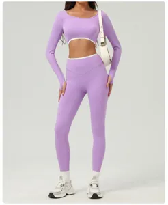 Purple long sleeve crop top and high waist yoga leggings set for women fitness workout gym.