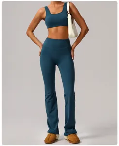 Detail view of a dark teal yoga set featuring a scoop neck sports bra and high-waist flared pants.