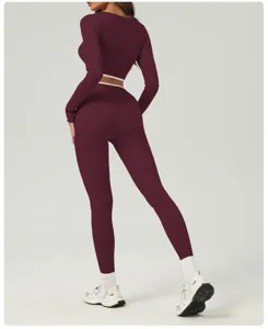Wine red activewear long sleeve top and high waist yoga leggings detail view for women fitness.