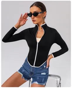 Detailed view of the women's contrast piping zip-up athletic sports jacket for fitness and yoga.