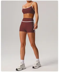 Detailed view of the contrast trim athletic bra and high waist fitness shorts for women.