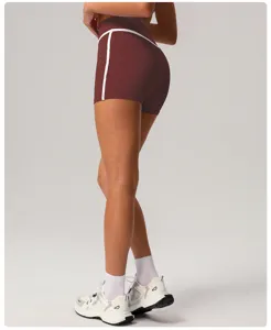 Color-block high-waist yoga shorts, tummy control, butt-lifting fitness sportswear, detail view.