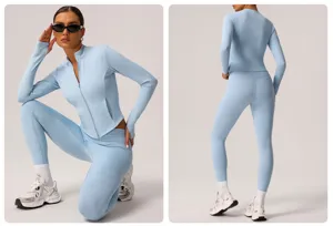 Detail view of women's light blue athletic zip-up yoga set, high waist fitness leggings suit.