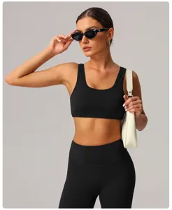 Ensemble soutien-gorge de sport et leggings de yoga noirs pour femme et fitness.