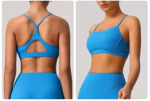Soutien-gorge de sport bleu, haut de yoga croisé élégant, vêtement de fitness séchage.