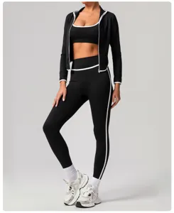 Women athletic 3-piece fitness yoga set black activewear jacket leggings detail view.