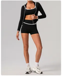 Detailed view of the women's athletic 3-piece set featuring contrast piping and high waist.