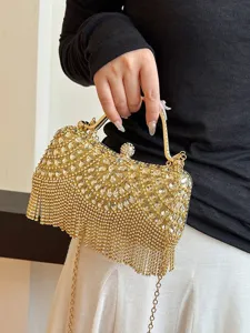 Luxury gold rhinestone evening clutch bag with sparkling fringe tassels and top handle