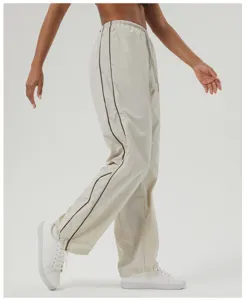 Casual contrast piping parachute pants with elastic drawstring waist for relaxed daily wear.