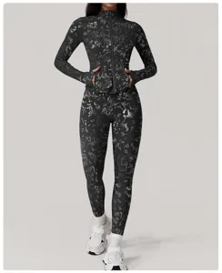 Silver foil activewear set long sleeve zip jacket and leggings for fitness and running workout.