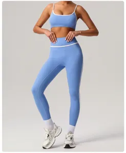 Light blue contrast yoga set detail, high waist leggings and sports bra for fitness workout.