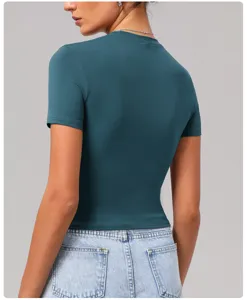 Close-up detail of the dark green slim fit short sleeve t-shirt back view for women.