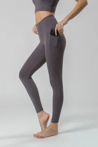 Leggings de yoga taille haute vue detail poche laterale, vetement fitness elastique.