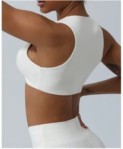 Soutien-gorge de sport blanc pour femmes, haut de yoga respirant pour entraînement.