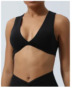 Soutien-gorge de sport noir croisé à l'avant, gilet de yoga respirant avec coussinet.