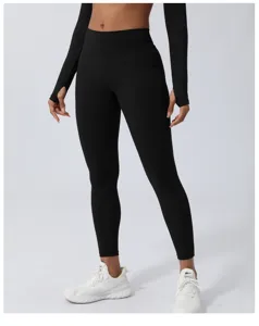 Nahtlose, hochgeschnittene schwarze Yogahose und langärmliges Sportoutfit für Fitness.