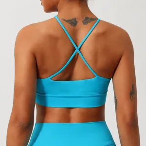 Reggiseno sportivo schiena scoperta incrociato top yoga fitness traspirante azzurro abbigliamento