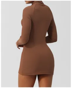 Brown ribbed long sleeve bodycon yoga dress detail, showing stretch fabric and back fit.