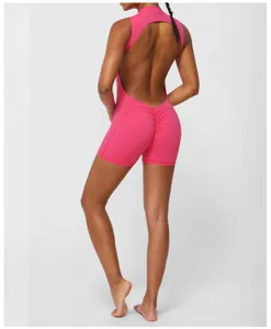 Femme rose dos nu sans manches combinaison de yoga fitness sport tenue de sport chic.
