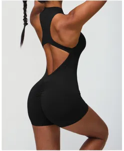 Zwarte rugvrije naadloze yoga jumpsuit vrouwen fitness bodysuit perzik heup sportkleding.
