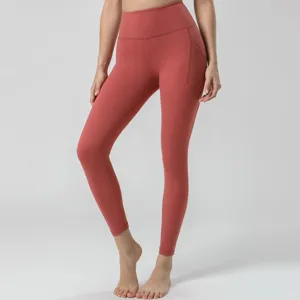 Pantalones de yoga de cintura alta para mujer, leggings deportivos rojo ladrillo con bolsillos.