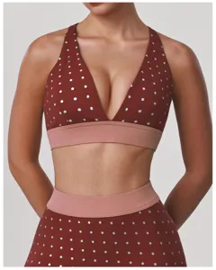 Soutien-gorge de sport à pois avec design dos croisé et bande contrastée pour le fitness.
