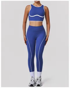 Completo reggiseno sportivo e leggings blu con bordo a contrasto bianco per fitness yoga.
