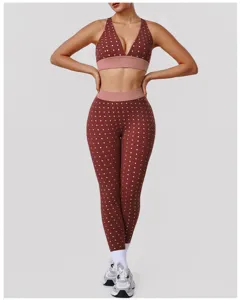 Close-up view of the brown polka dot sports bra and high-waisted yoga leggings detail.