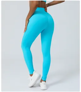 Hoge taille push-up fitness yoga leggings detailweergave, helderblauwe stretchstof.
