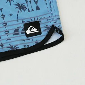 Quiksilver pantaloncini mare uomo asciugatura rapida dettaglio con stampa palme e logo.