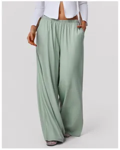 Detailed view of women's light green high-waisted draped wide-leg casual pants fabric.