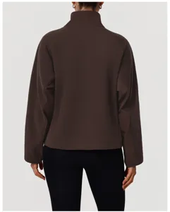 Back view of women brown fleece jacket detail showcasing warm stand collar and soft fabric texture