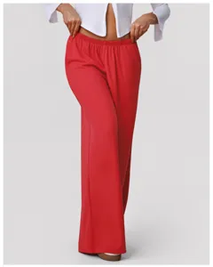 Red high waist draped wide leg trousers detail, soft flowing fabric for casual wear.