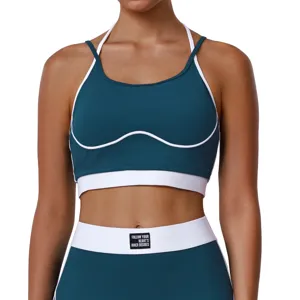 Ensemble soutien-gorge de sport colorblock et pantalon de yoga pour fitness entrainement.