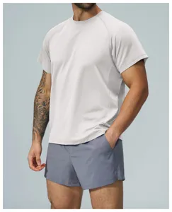 Close-up view of men's breathable athletic t-shirt in light gray, ideal for fitness workouts.