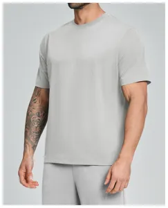 Detailed view of the lightweight grey athletic t-shirt fabric and short sleeve cut.