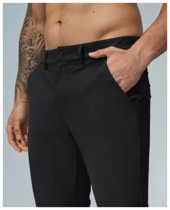Men's black casual golf trousers detail view, comfortable quick-dry stretch fabric.