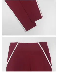 Nahaufnahme von burgunderroten Yogahosen mit weißen Seitenstreifen und stützendem Bund.