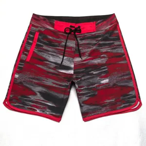 Close-up detail of the red and black abstract pattern, contrast piping, and adjustable drawstring.