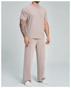 Mens casual sportswear t-shirt and loose pants set, comfortable fit for daily wear and workouts.