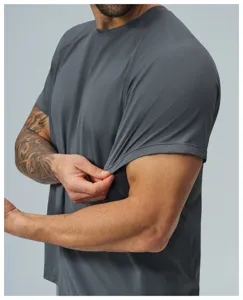 Close-up of men's grey athletic t-shirt showing stretchy quick-dry fabric texture.