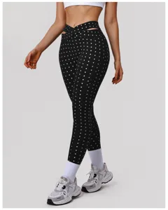 Hoge taille crossover polka dot yoga leggings, ademende fitness sportbroek.