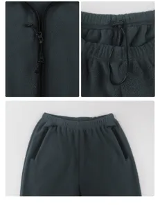 Detailed view of the dark grey double-sided fleece casual suit, showcasing zipper and pockets.