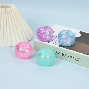 Glitter apple stress relief toy closeup, translucent slow rebound squishy product detail.