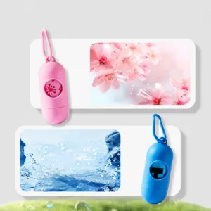 Portable pet waste bag dispenser with hook, cute capsule design for dog poop pickup outdoors.