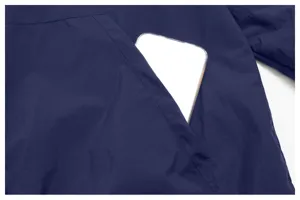 Men outdoor sports sun protection jacket pocket detail close-up view lightweight blue fabric.