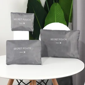 Grey travel storage bag detail view, portable waterproof organizer pouch set for trips.